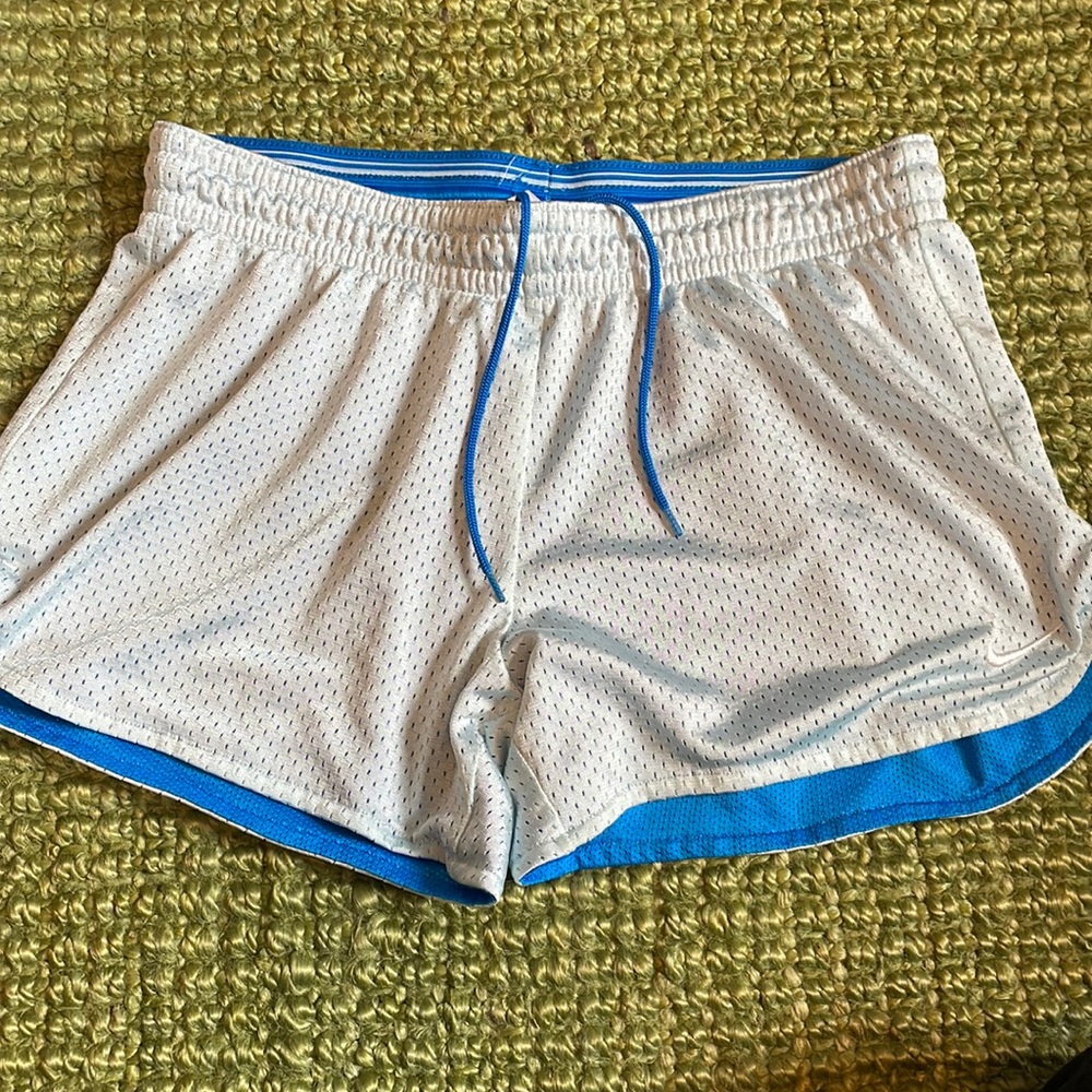 VINTAGE NIKE SHORT SHORTS, light blue on the outside deeper blue on the inside